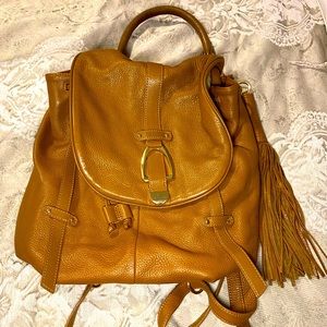 G.I.L.I. Cognac leather multifunction handbag.